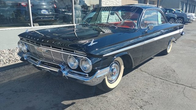 1961 CHEVY IMPALA Base in Black — front three-quarter view