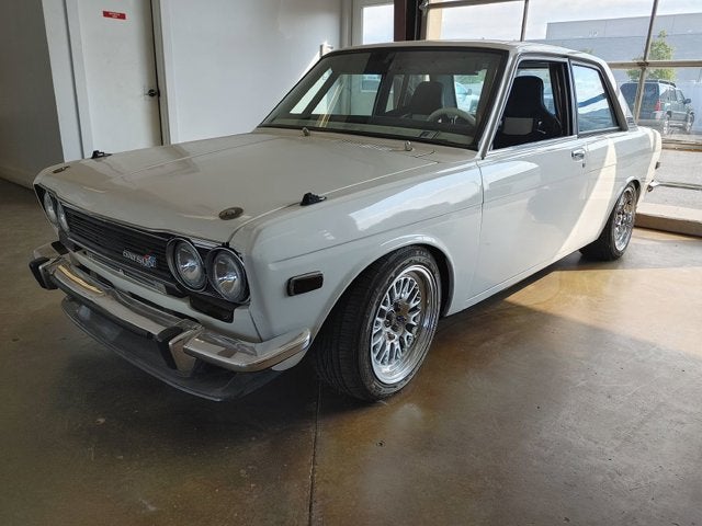 1971 DATSUN 510 Base in White — front three-quarter view